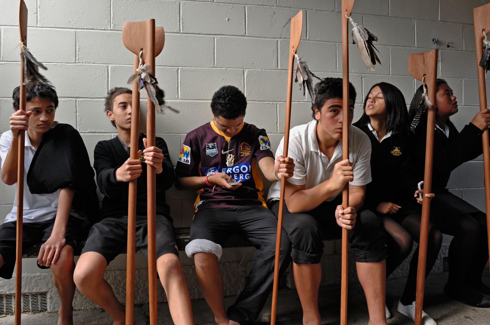 Students from Whakatane High School await their taiaha practice, part of a cohort of Maori in a population strongly biased toward youth. More than half of Maori will be under 30 in 2026. The relatively high working age population means they stand to reap an economic dividend if they can overcome the challenges created by long-standing structural inequality.