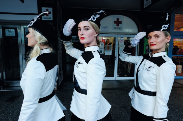 Mary Jane O’Reilly’s burlesque dance troop put on a live performance as the White Nights Marching Team, left, outside St Kevin’s Arcade at K’ Road’s First Thursdays ‘fiesta’ event. The events are run by the K’ Road business and arts community to showcase the creative spirit of the street.