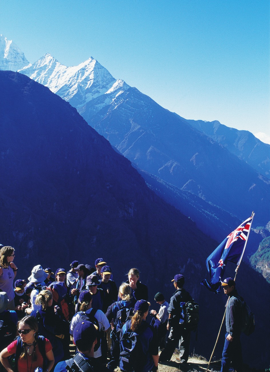 Others, including teenagers in the regular Youth To Everest programme, here showing the Kiwi flag high in the Himalayas, have now taken up the cause.