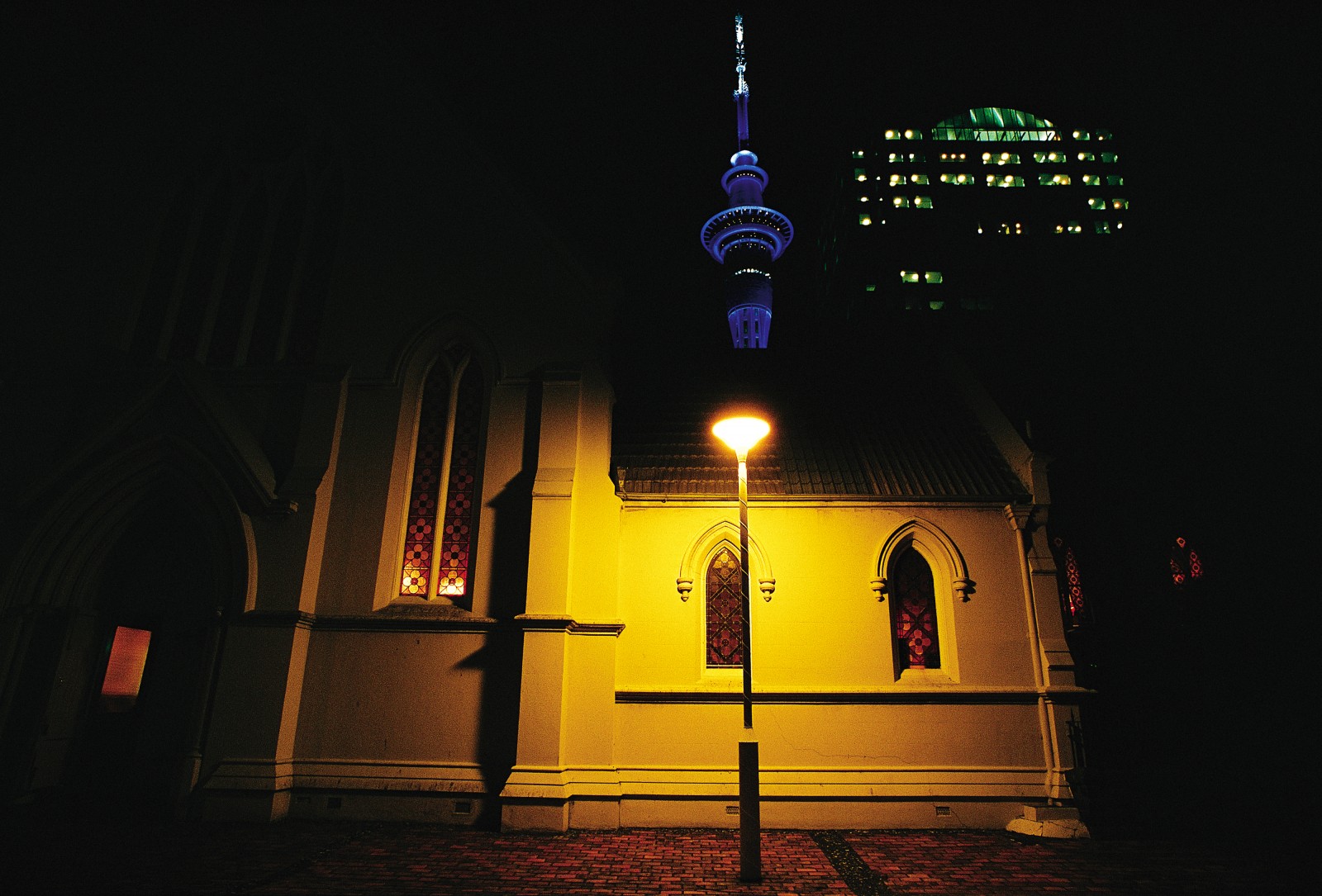 Cathedrals were once the grandest buildings in our cities, dominating the skylines, but no longer. Auckland's St Patrick's Cathedral, a commanding presence 100 years ago (above, historical photo), is now overshadowed by the Sky Tower and casino complex just a block away. But the Church is not rooted in such ephemera. It has survived 2000 years, and, by the grace of God, will continue to serve people and prick the conscience of society for a long time yet.