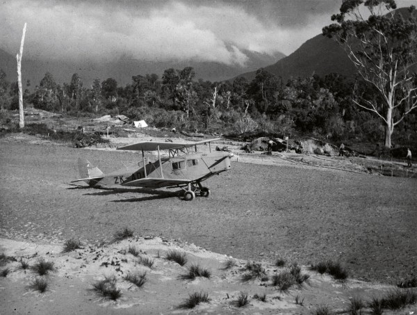 No wharf was built until 1939, five years after Bert Mercer started flights into the area (top), easing isolation for the hardy pioneering families, such as the Harrises of Okuru (bottom) who stayed on.