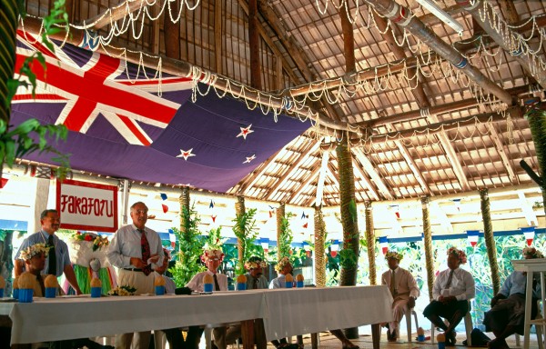 United Nations delegation addresses the elders of Fakaofo in the village's ornate meeting house, encouraging them to continue the decolonisation process. Islanders are ambivalent about independence; they want a greater say in their own affairs, but also want to retain New Zealand's annual aid package, which equates to around $2500 per person. The link with New Zealand goes beyond monetary assistance. Many of Tokelau's children leave their homes for a scholarship-funded education in New Zealand. Well-educated young people are regarded as Tokelau's best hope for making a successful transition from subsistence society to modern Pacific state.