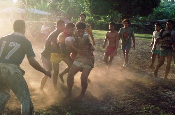 Even the smallest villages support grand wedding cake churches and rugby fields. But these youths, practising for the Vailima (a brand of beer) Cup, won't be training, or even enjoying a swim, on Sunday. It is a day of enforced rest: for eating, sleeping and going to church (above).