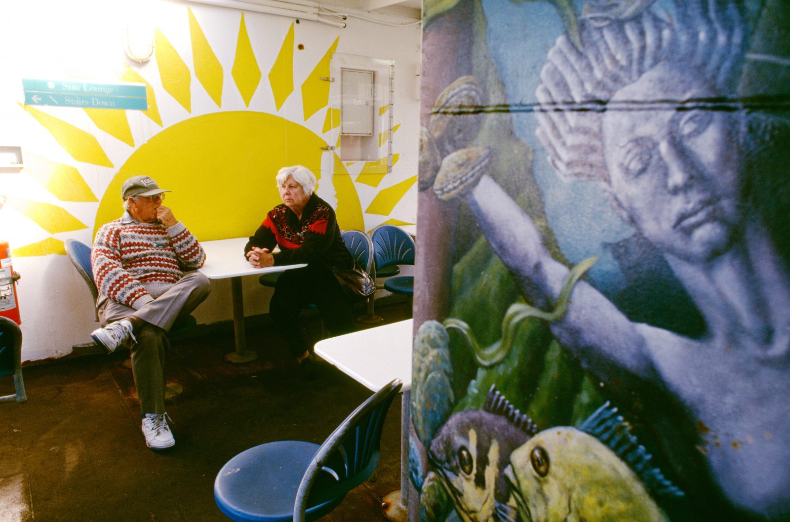 35_Cook_Strait_05 Lest passengers get too cosy in the Sun Lounge of the interisland ferry Aratika, a mural reminds them of the attractions of Davy Jones' locker not far below. More than a million passengers are carried across the Strait each year on the ferries' 5000-plus crossings.