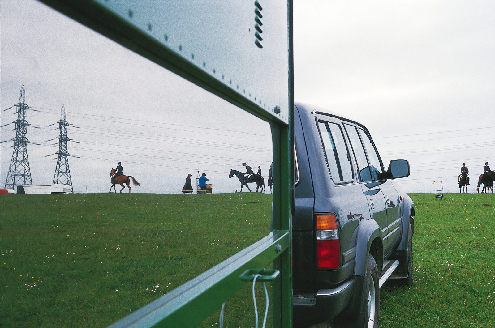 The last riders leave the ground on the final ribbon day held at the Albany Pony Club's Bass Road grounds, October 1996, before the machines move in. Like riverboats, kauri trees, gumdiggers and orchards, horses are a reflection of a rural Albany now past, as the area looks forward to a new incarnation as a focus of Auckland's growth.