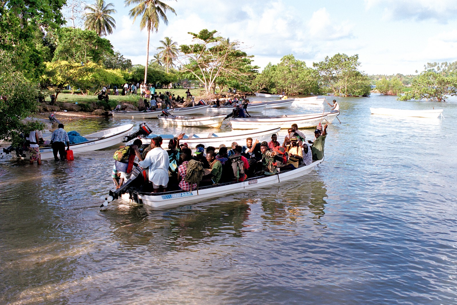 A postcard image of present-day Pacific tranquillity belies the fact that banana boats such as these, ferrying people to and from the Buka market, kept the independence struggle alive. During the war they were used to run the gunboat blockade and to evacuate medical emergencies to the neighbouring Solomon Islands.