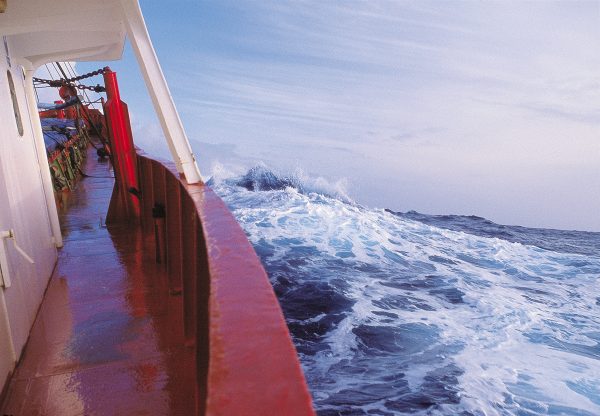 58_CampbellIsland_body01 The freighter Jenka ploughs through the Southern Ocean loaded with food, fuel, rat bait, equipment and personnel, bound for Campbell Island. The ship took three days to cover the 900-odd km from Timaru to Perseverance Harbour.