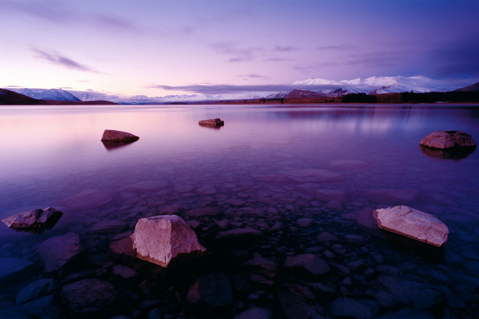 Potential energy. Lake Tekapo contains six cubic kilometres of water, a massive cistern at the base of the Alps feeding Tekapo-A power station. The outflow continues to Tekapo-B on Lake Pukaki and on to stations at Ohau, Benmore, Aviemore and Waitaki, providing 6700 GigaWatt hours of electricity annually. 