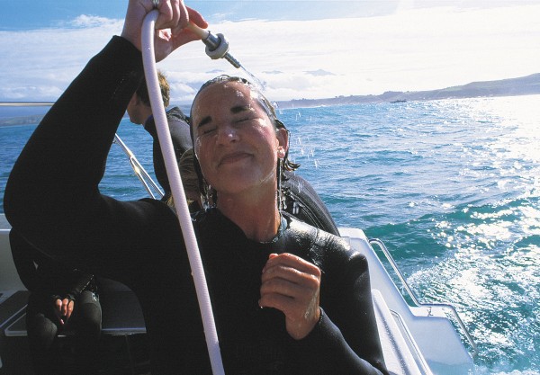 58_Kaikoura_body15 A squirt of hot water is a welcome restorative after a heart-warming but chilly swim with dolphins.