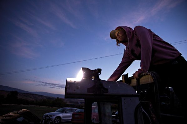 Emily Irwin tests the spotlight attached to the top of her father’s Land Rover. The most successful bunny hunting teams shoot from dusk until dawn: night usually brings a greater yield of rabbits than day, with bunnies more likely to freeze on the spot than run. Shotguns are the weapon of choice (above). 