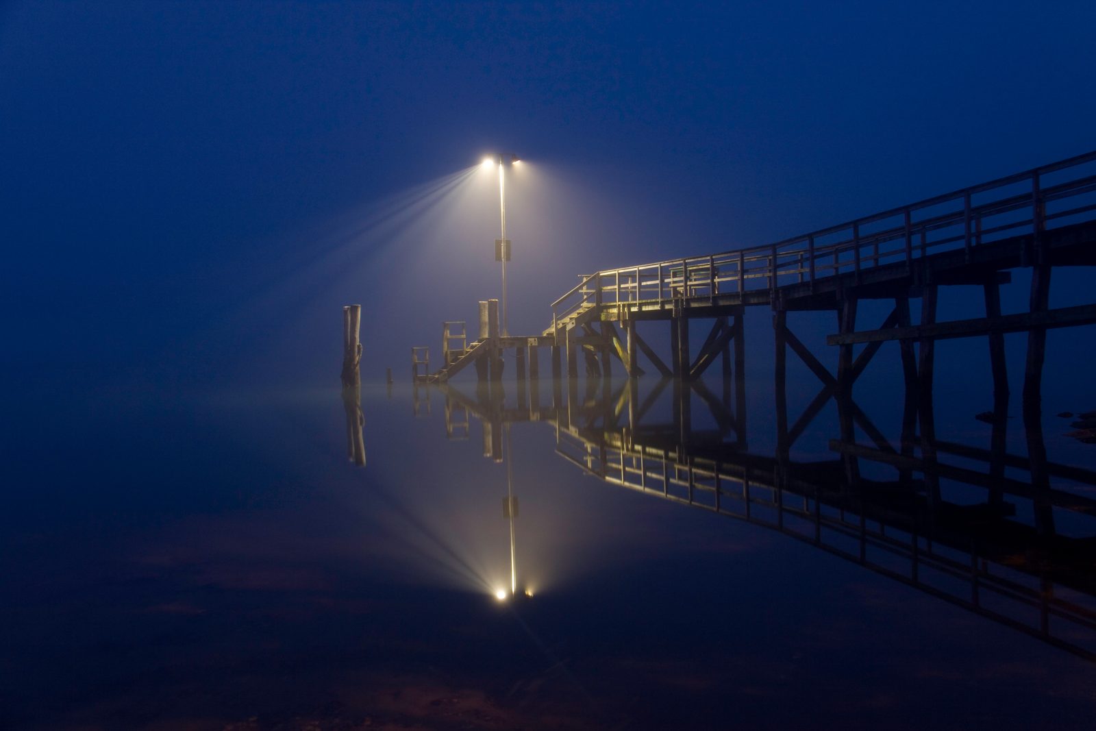 A shot of the Beach Haven wharf, at Larkin’s Landing, taken just before dawn in September. With no wind the water is like glass and the thick fog provides a lovely ambience.