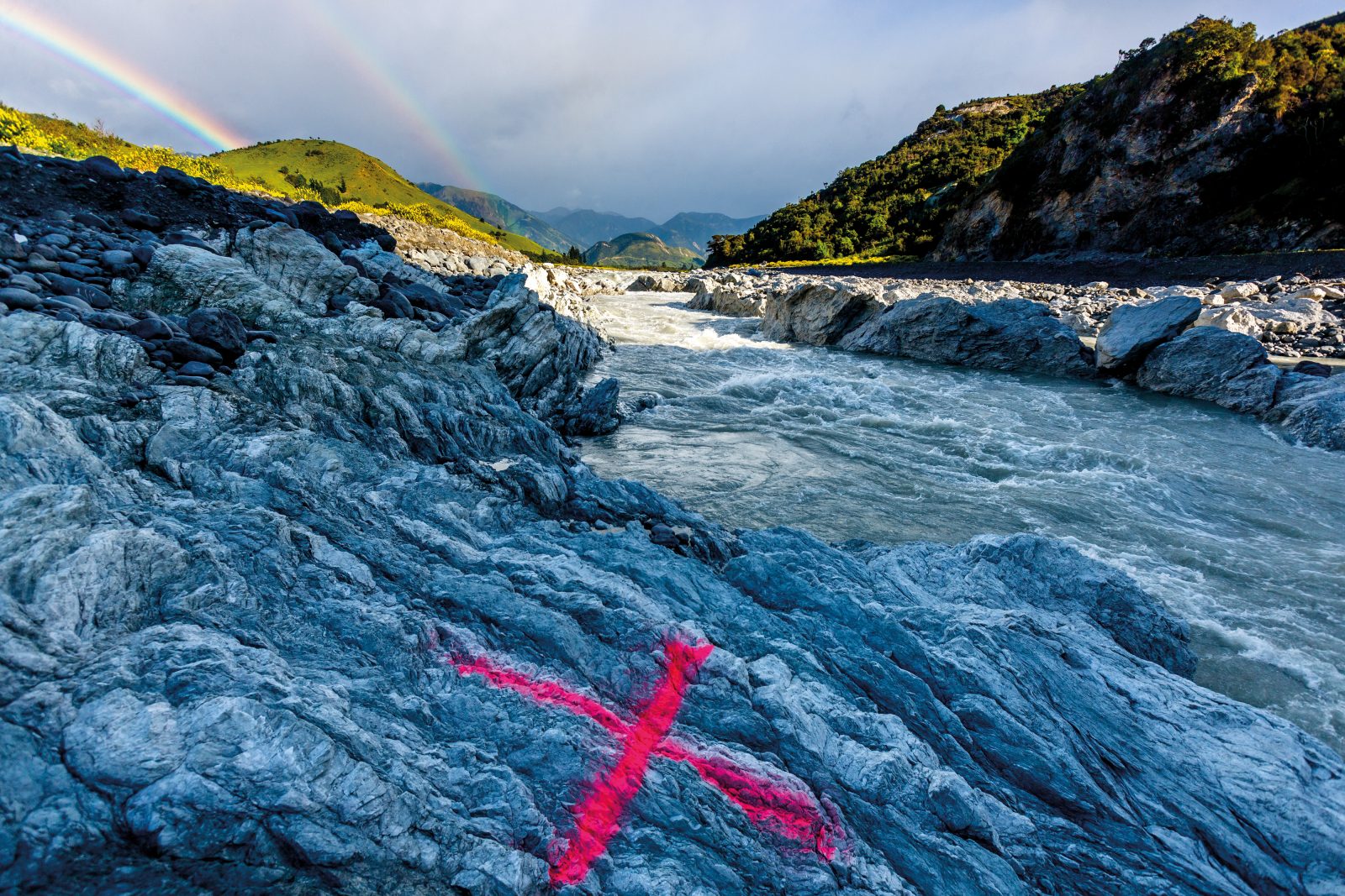 Amongst the devastation, some positives: kayakers and rafters are excited about this brand-new Class V rapid rumbling in the once lazy, braided Clarence River, after the Papatea Fault ripped through the middle of it and altered the gradient. X marks the spot where a GNS team has taken a precise GPS measurement—the bright spraypaint is easy to make out in aerial drone photographs and can be incorporated into high-resolution 3D maps of the site. 